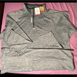 Reebok Mock neck performance shirt. New with tag